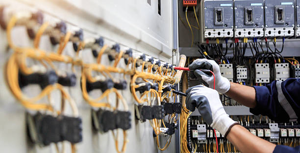 Professional Electrician technician working in Raleigh Hills, OR